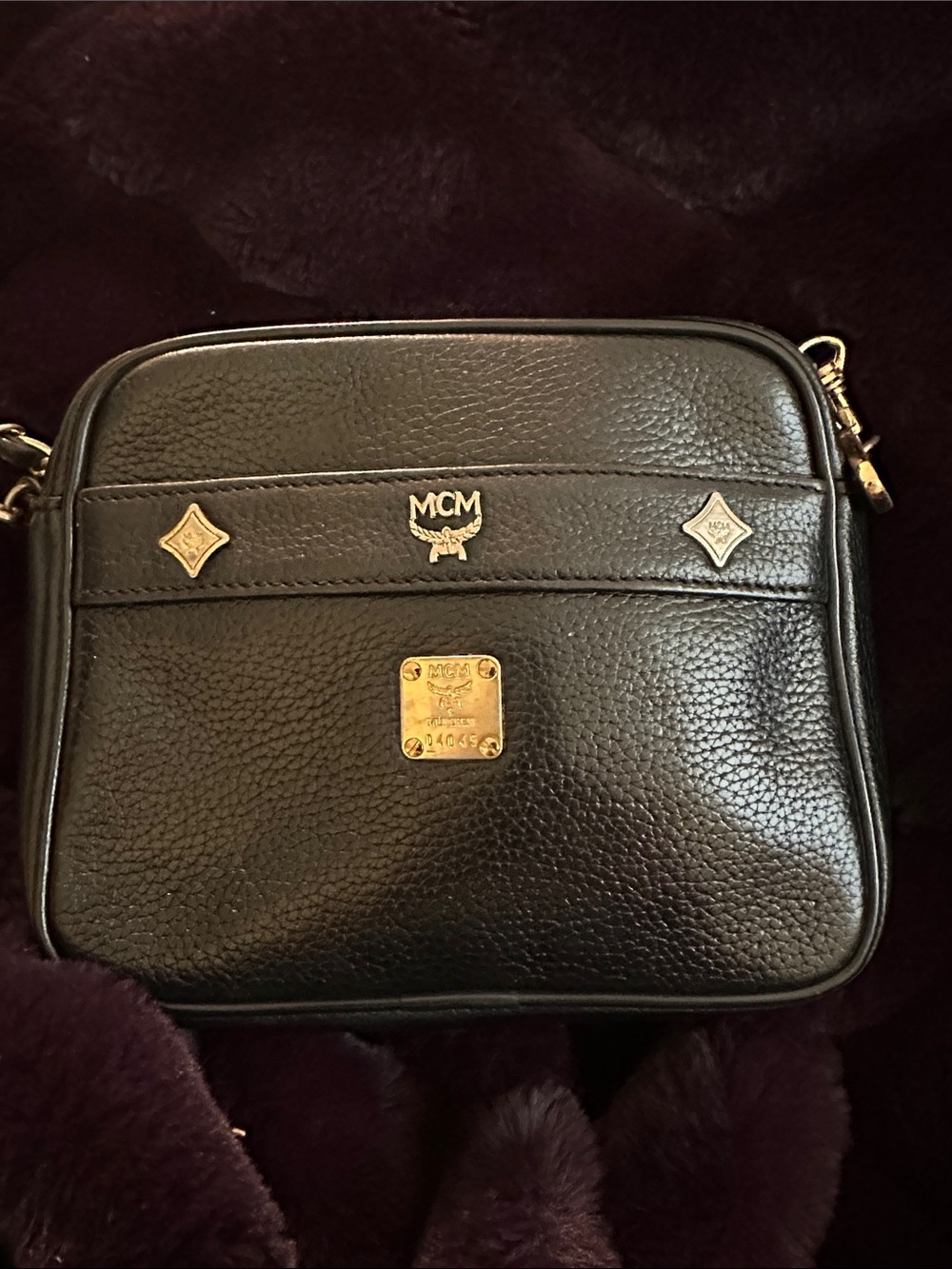 MCM Black Pebbled Leather Shoulder Bag with Gold Accents